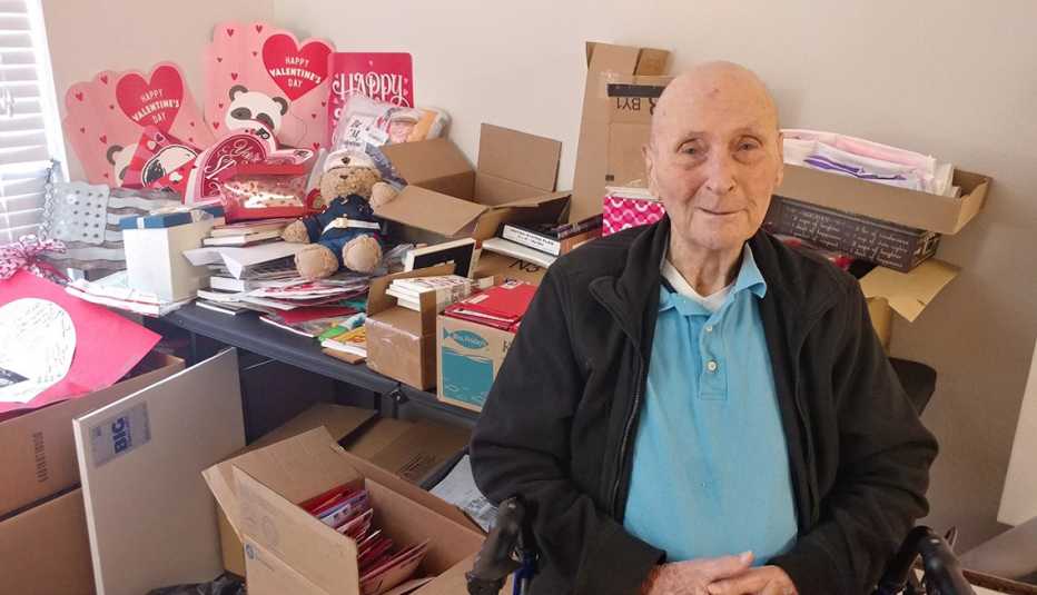 Bill White in a room surrounded by Valentine's Day cards Bill White in a room surrounded by Valentine's Day cards