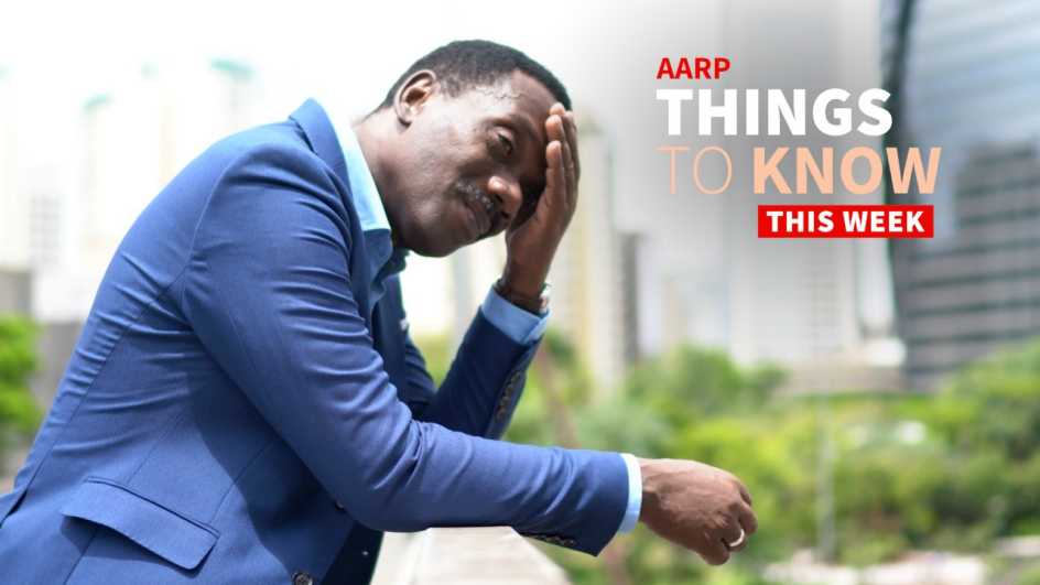 a photo shows an older adult man with his hand on his brow