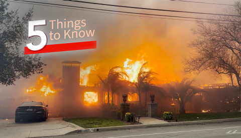 A fire burning a house