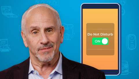 Tech Guru Ed Baig in front of a blue background next to a smartphone with a Do Not Disturb icon turned on