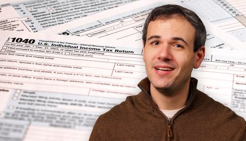 dan bortz in front of 1 0 4 0 tax forms