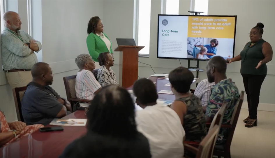 Group looking at a presentation on a screen