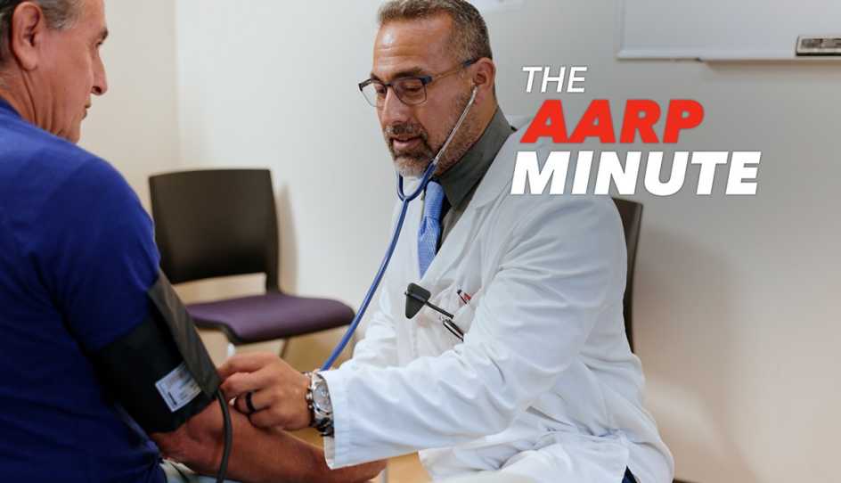 a doctor is checking a man's blood pressure