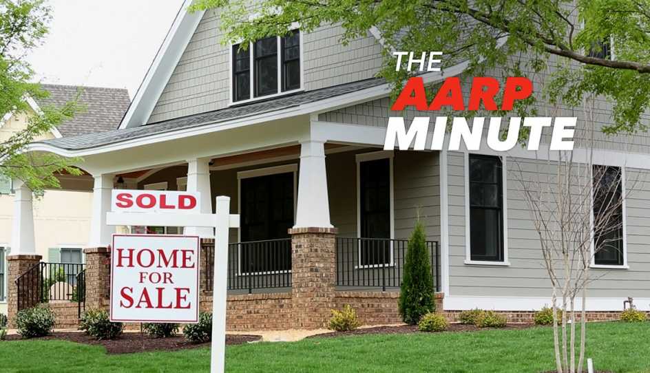 a house with a for sale sign out front