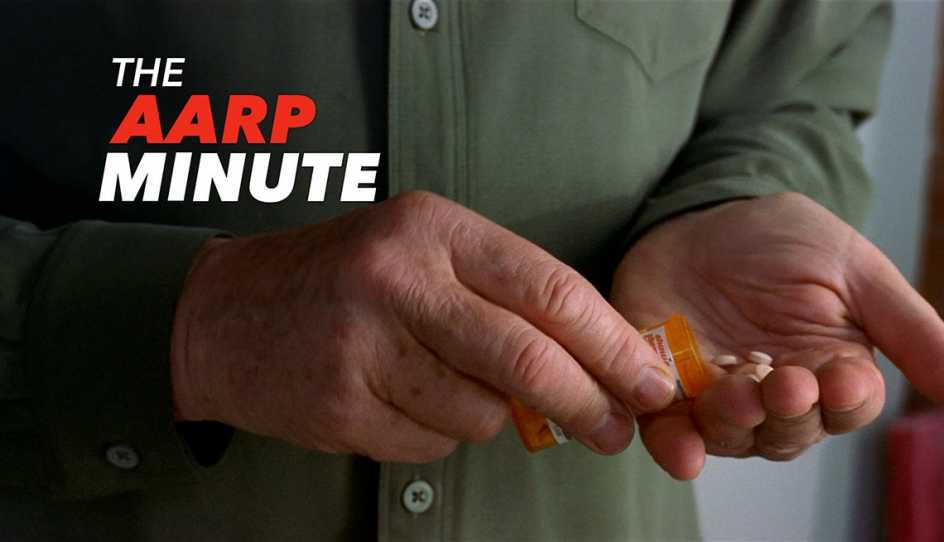 a person is putting pills in their hands