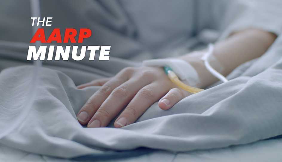 a hand on a bed at a hospital