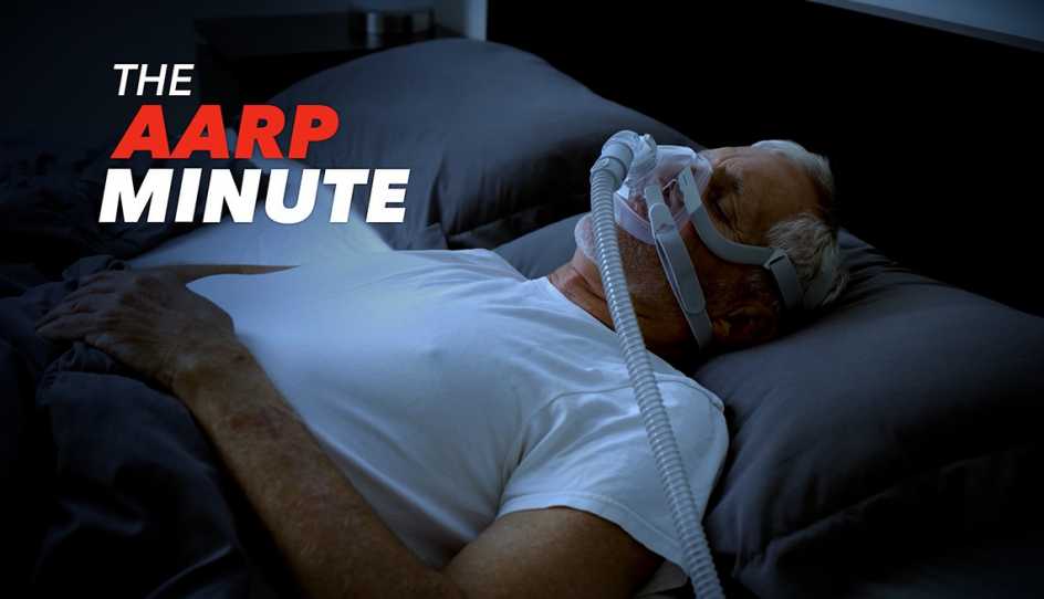 a man wears a mask to help with sleep apnea
