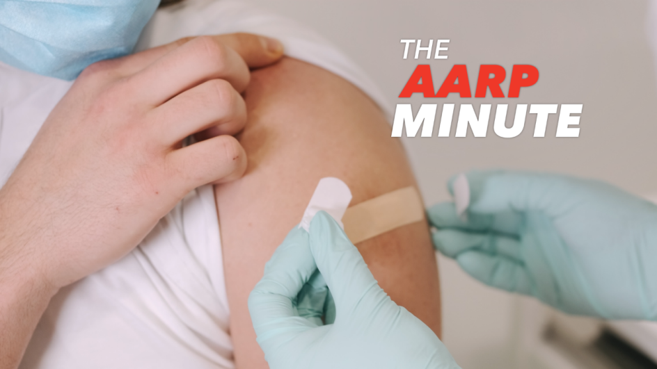gloved hands putting a bandage on a person's arm