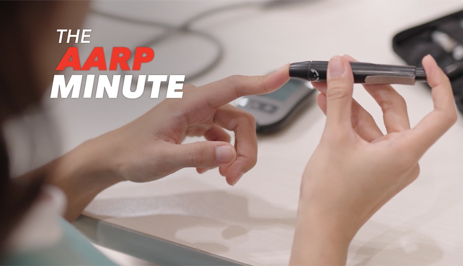 a person is sticking their finger with a blood test