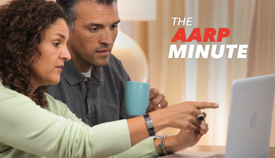 two people looking at a computer