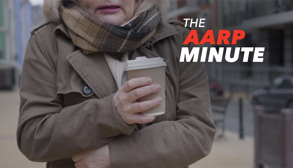 a person holding a cup in their hands while they are shivering from the cold