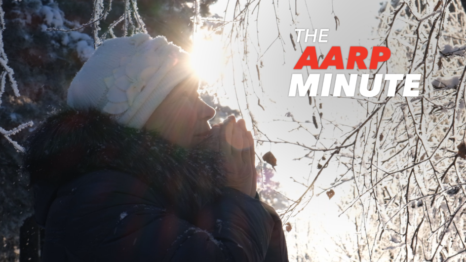 woman outside with a stocking cap and gloves on