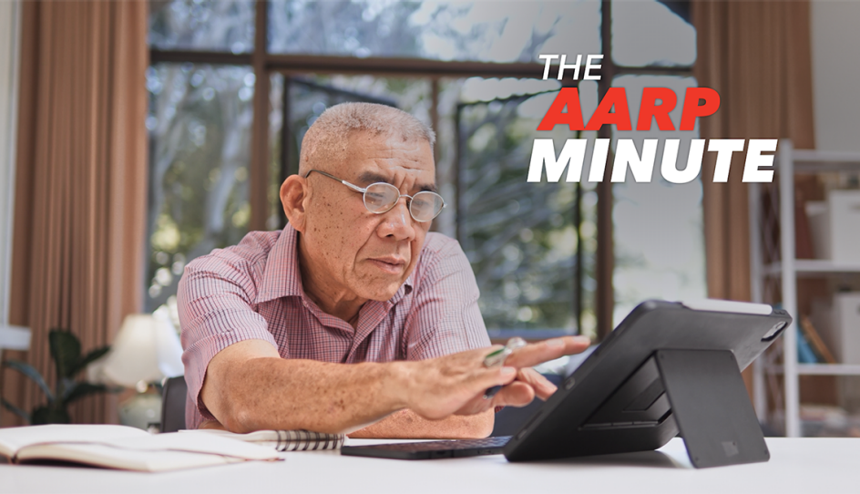 a man looking at his tablet