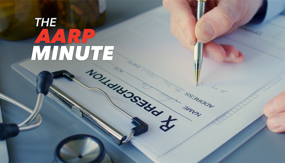 a person signing a paper with a pen