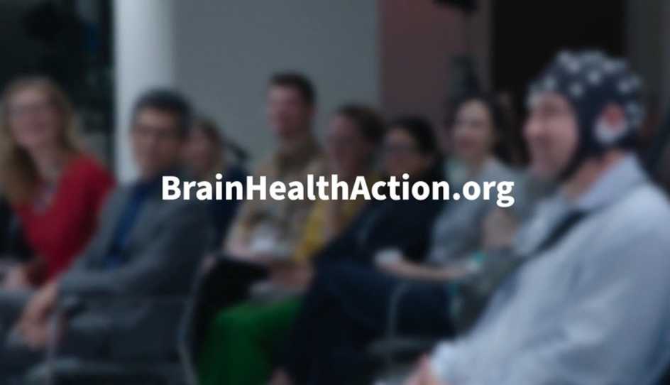 People sitting at the Music & Brain Health Summit with the text "BrainHealthAction.org"