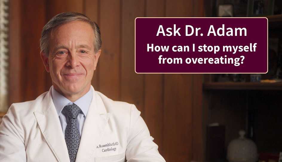 dr adam sitting in his office