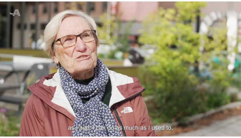 Woman being interviewed about her experiences with travel destinations.