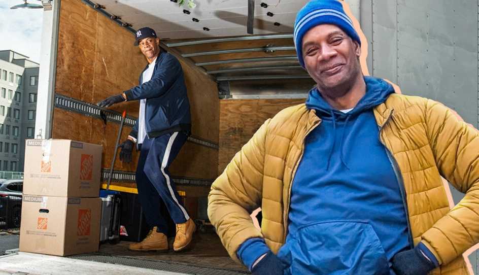 a man moving boxes out of a truck