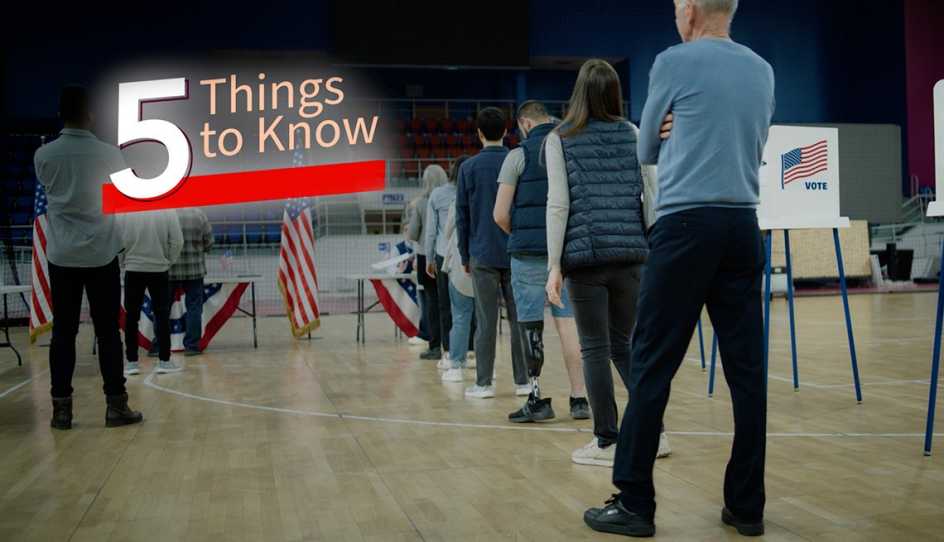 People waiting in line at an election voting center