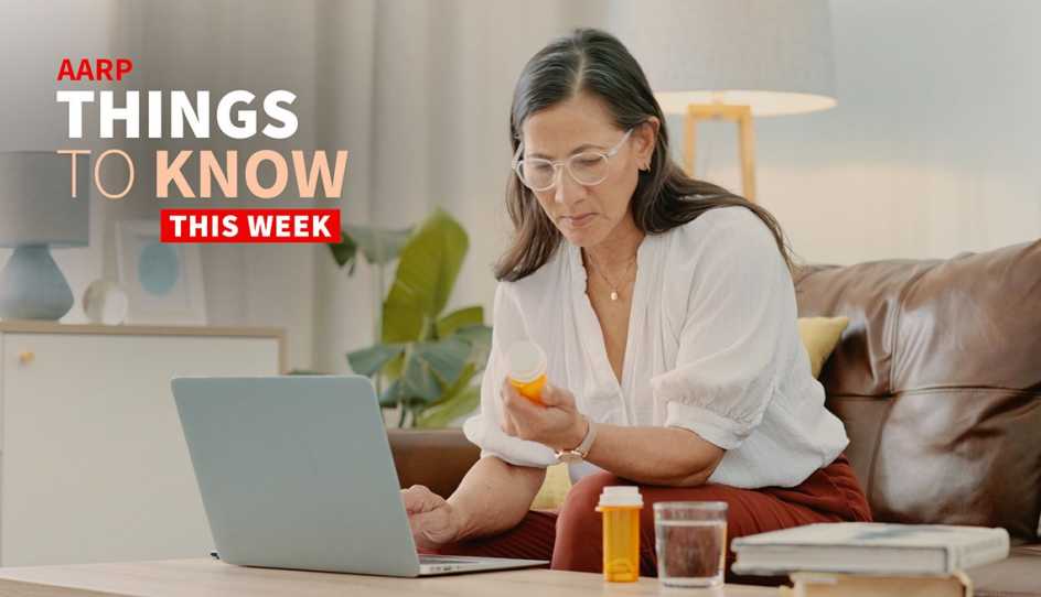 a woman is looking at pill bottles while working on a computer