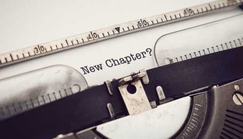 the words new chapter followed by a question mark on typewriter paper the words new chapter followed by a question mark on typewriter paper