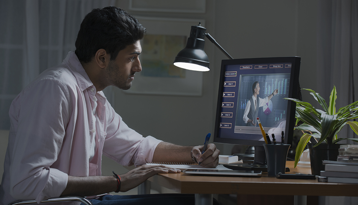 A man taking an online course to boost his career