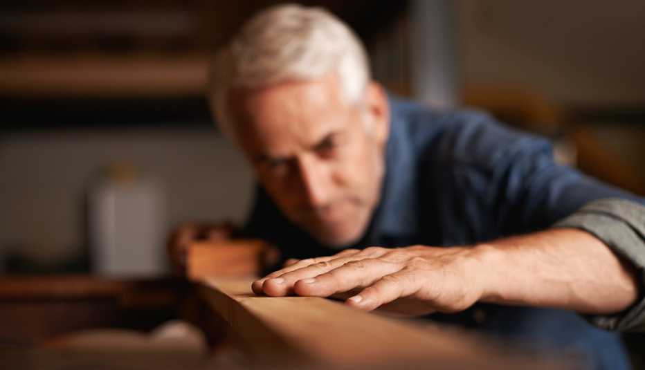 Man Working on Wood, Discover Your Strengths and Talents, Work, Career Change, AARP Man Working on Wood, Discover Your Strengths and Talents, Work, Career Change, AARP