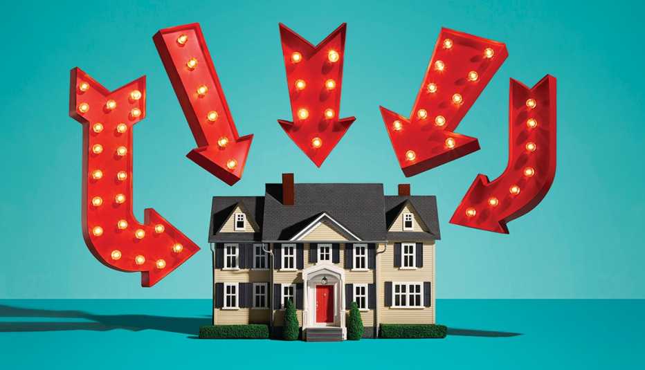 a house with a bunch of red arrows pointing toward it