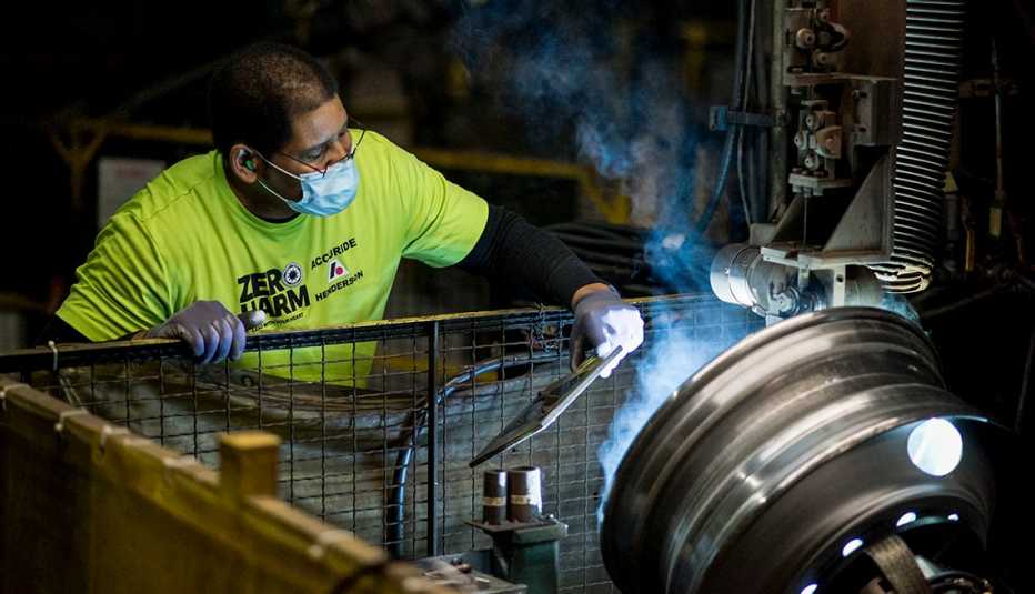 Tryone Garnett at work at a Whirlpool factory