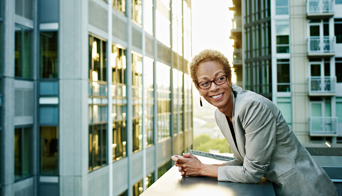 Mature woman happy at work 