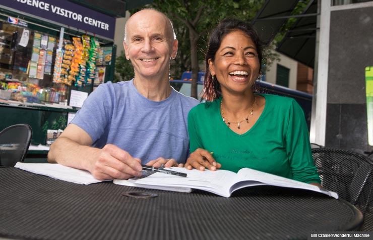 Robert Groves tutors Bekha Maya Maharjan in reading English, Encore Careers (Bill Cramer/Wonderful Machine)