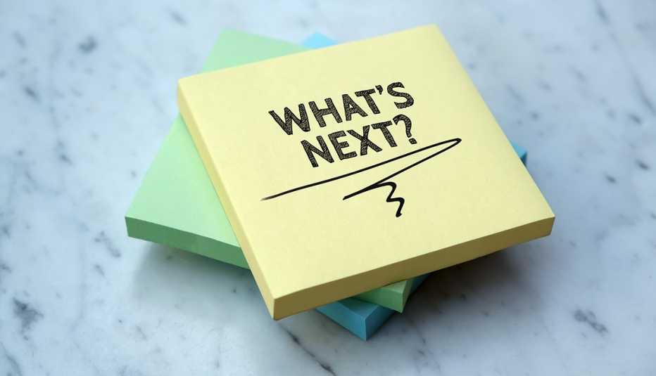 stack of sticky notes with the question whats next written on the top one