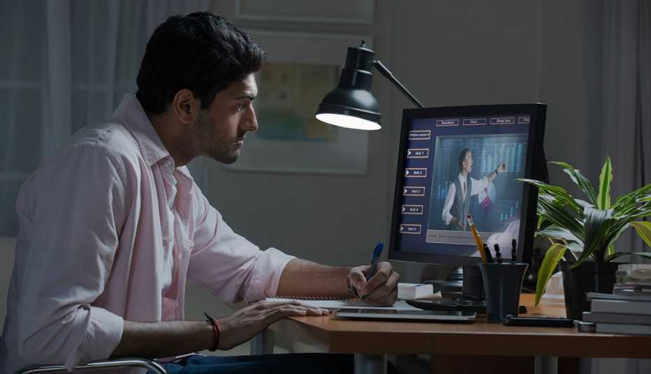 A man taking an online course to boost his career