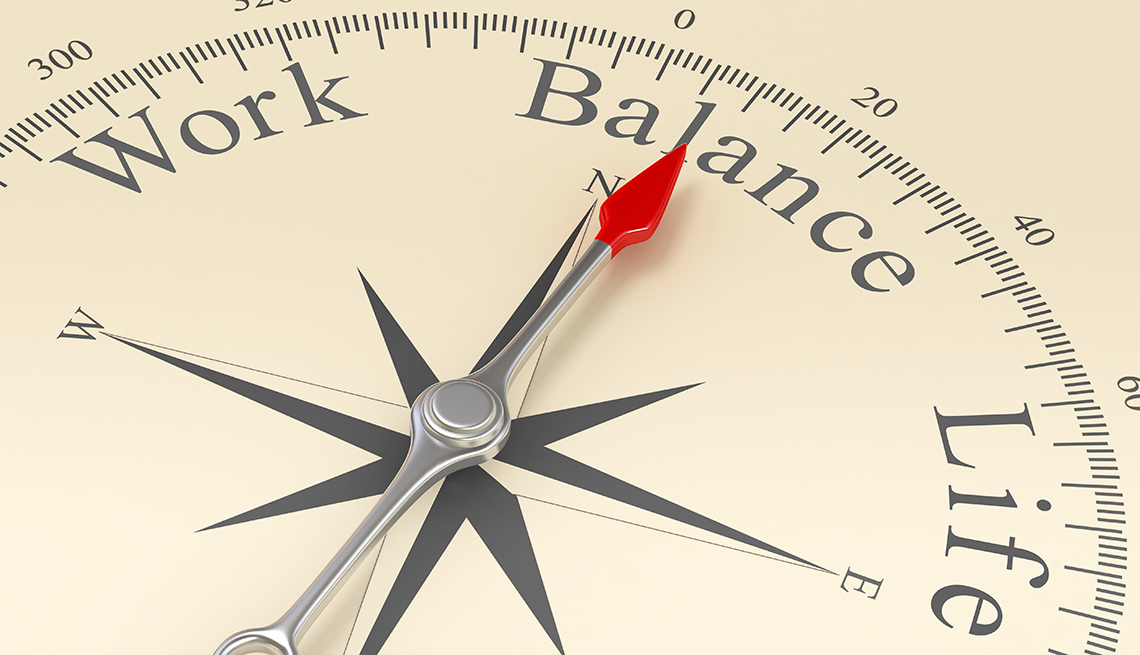 A compass that says work life balance
