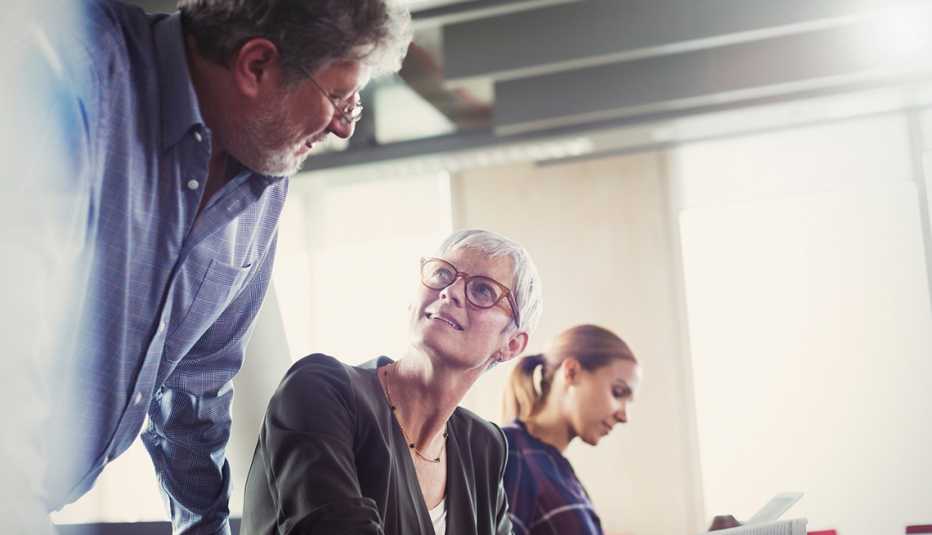 Two mature people talking in office, Thinking of Changing Careers