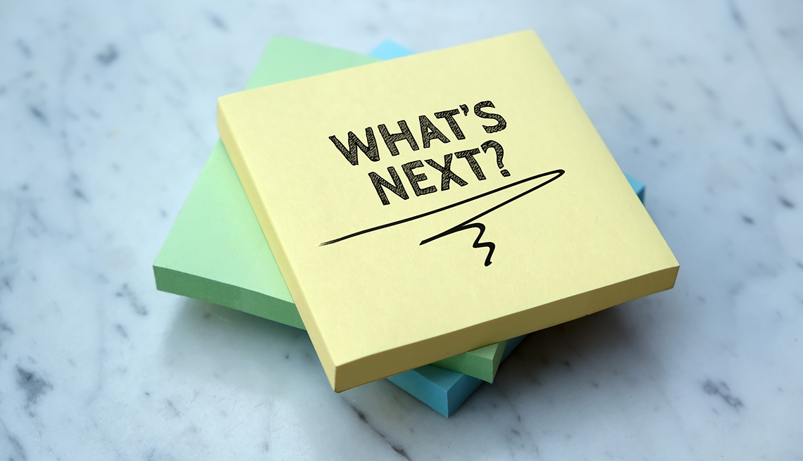stack of sticky notes with the question whats next written on the top one