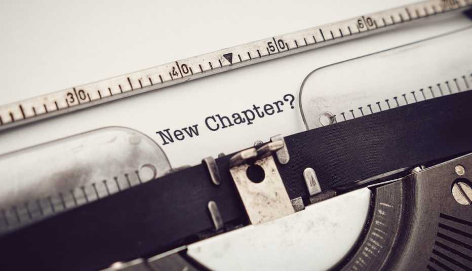 the words new chapter followed by a question mark on typewriter paper