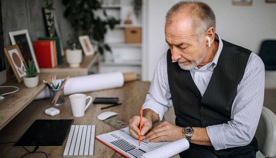 A man is working from his home office