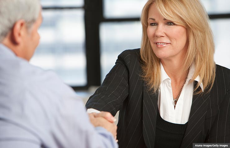 Business meeting. Tips to improve your LinkedIn profile. (Aluma Images/Getty Images)