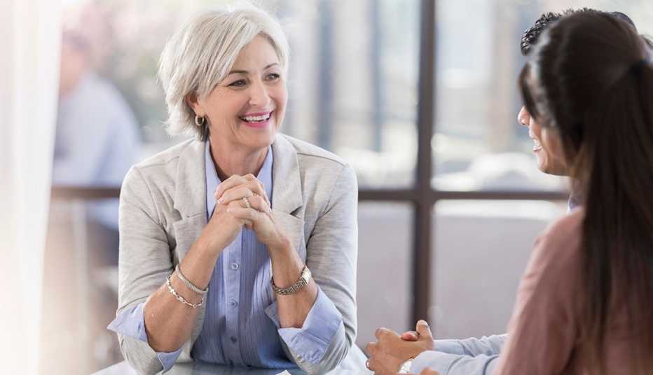 A woman is being interviewed for a job
