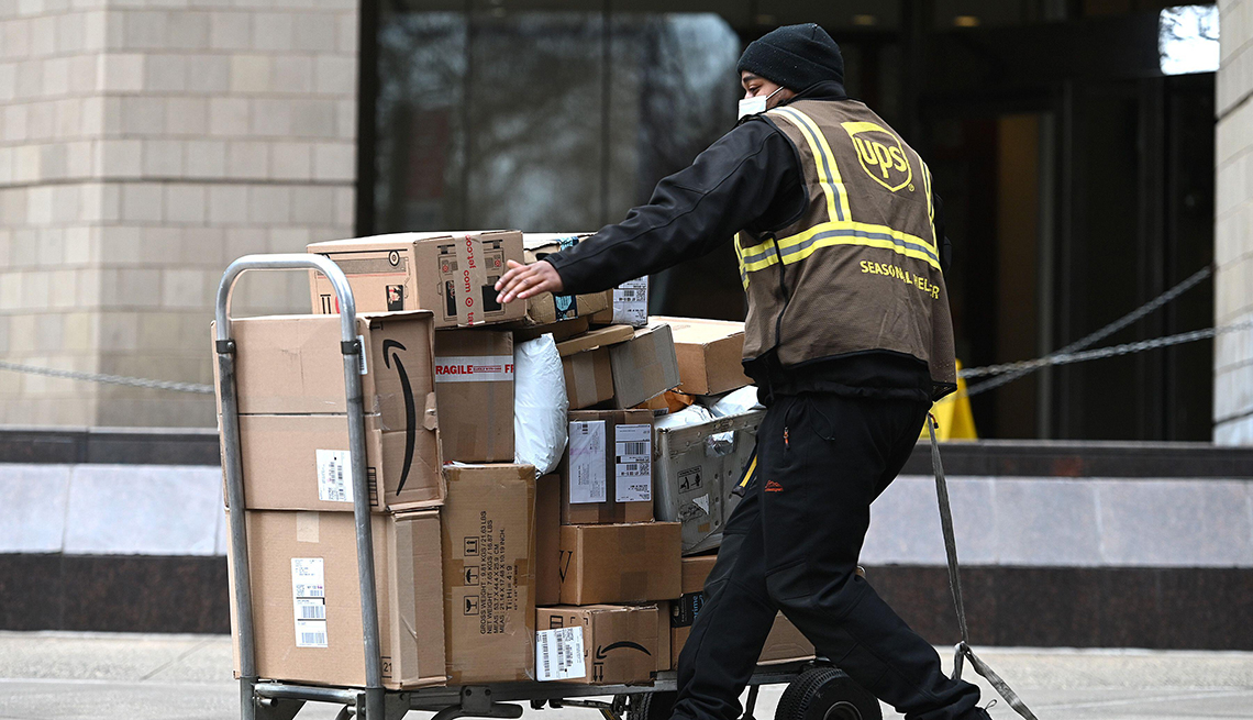 A U P S worker with packages