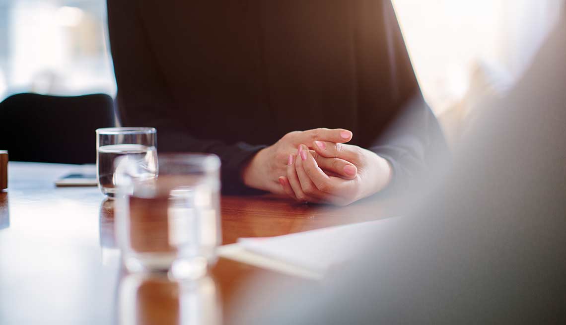 a woman answering tough interview questions