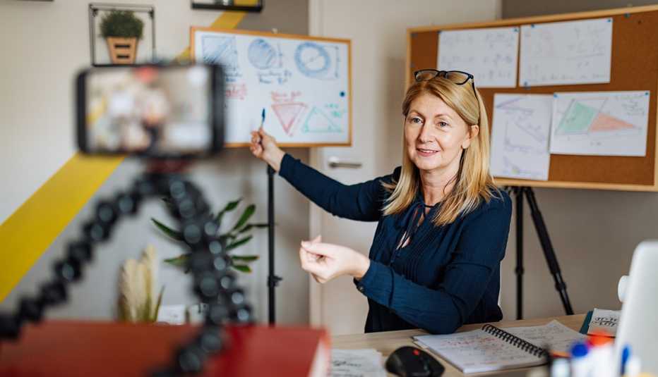 A woman is teaching an online class