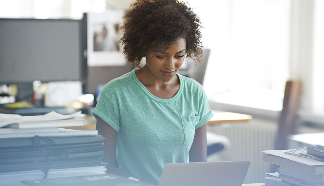 African-American Woman on Laptop, LinkedIn Profile Tips, Job Search