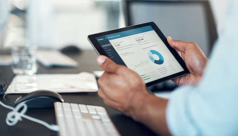 A person holding a tablet