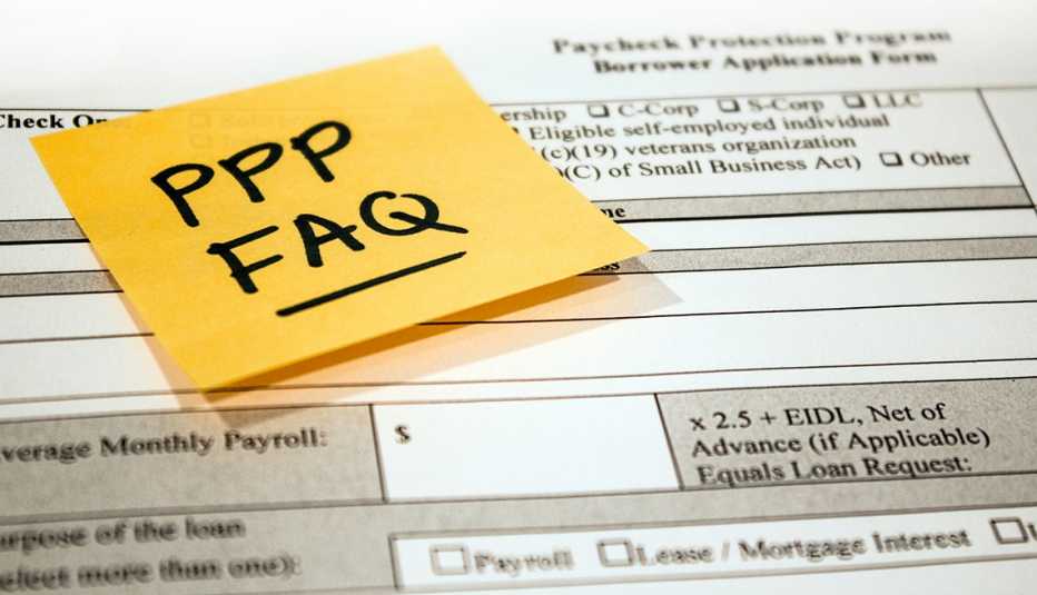 A yellow sheet of paper with P P P F A Q written on it in black ink
