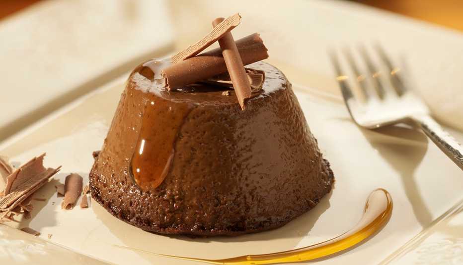 Chocolate and Coffee Flan Caramel, Fork and Plate, Recipes to Prepare with Your Grandchildren Chocolate and coffee flan caramel is shown on a white plate in this undated photo. Decorate this delicious and traditional dessert with raspberries, cherries or strawberries.