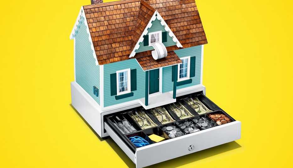 Caja resgistradora en forma de casa Caja resgistradora en forma de casa