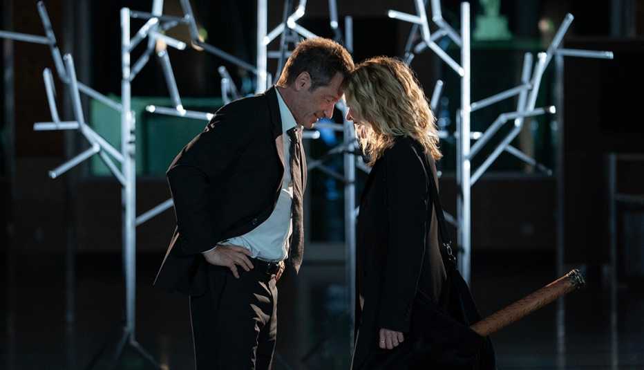 David Duchovny and Meg Ryan place their foreheads against each other in the film "What Happens Later."