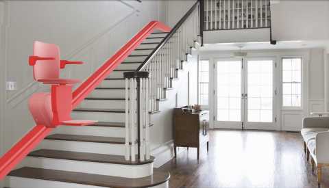 red mock visualization of a chair lift displaying an example of safer stairways red chair lift displayed along a stairway